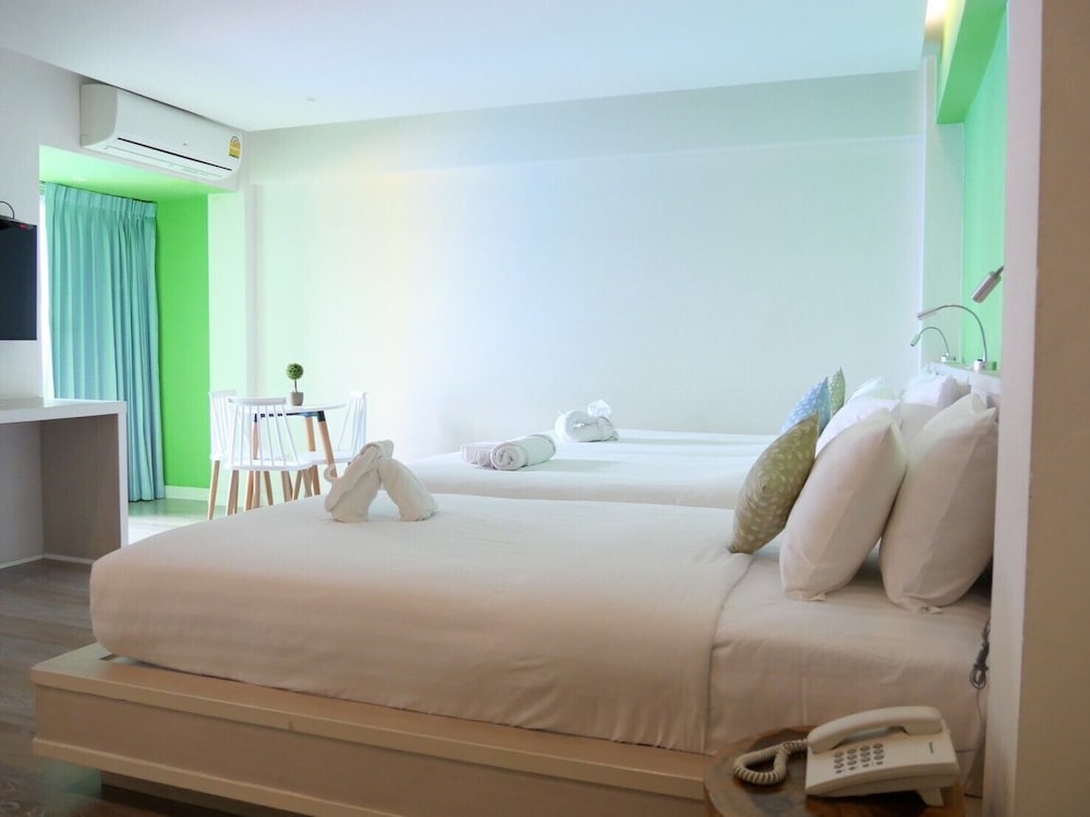 Deluxe Triple Room - Photo 17