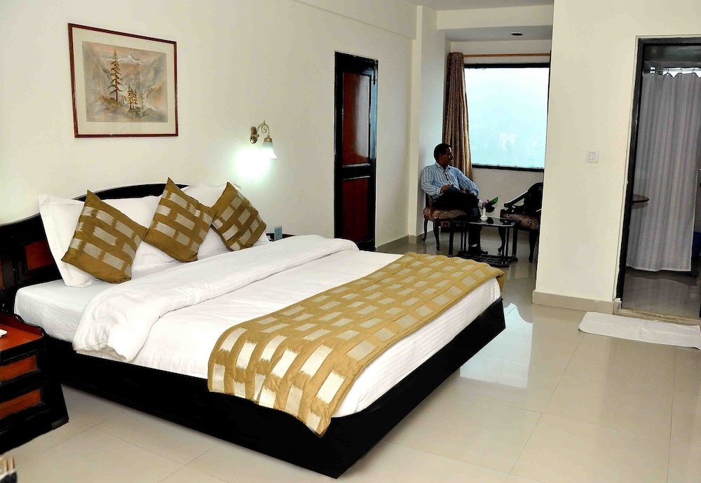 Deluxe Room - Photo 13
