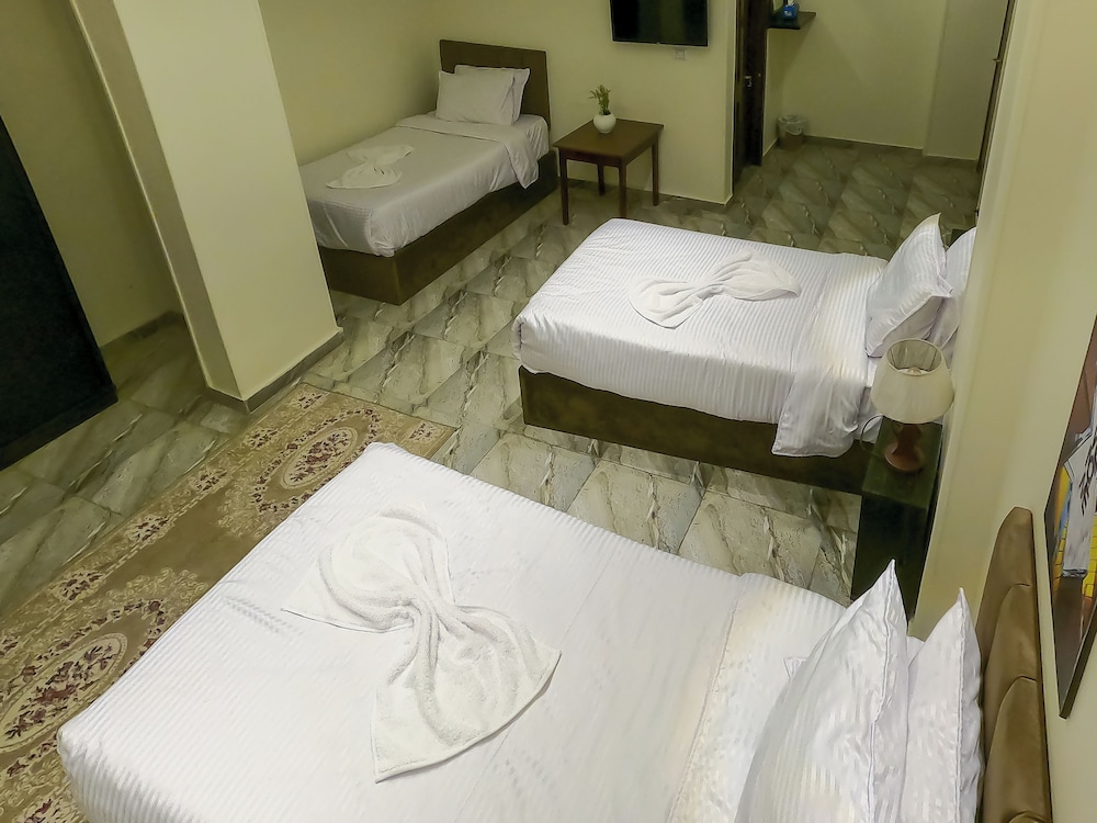 Economy Quadruple Room, Multiple Beds, City View photo 2