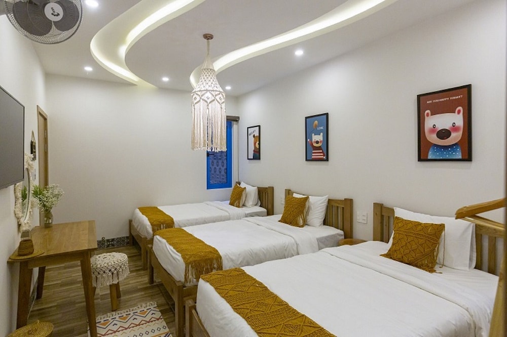 Deluxe Triple Room - Photo 1