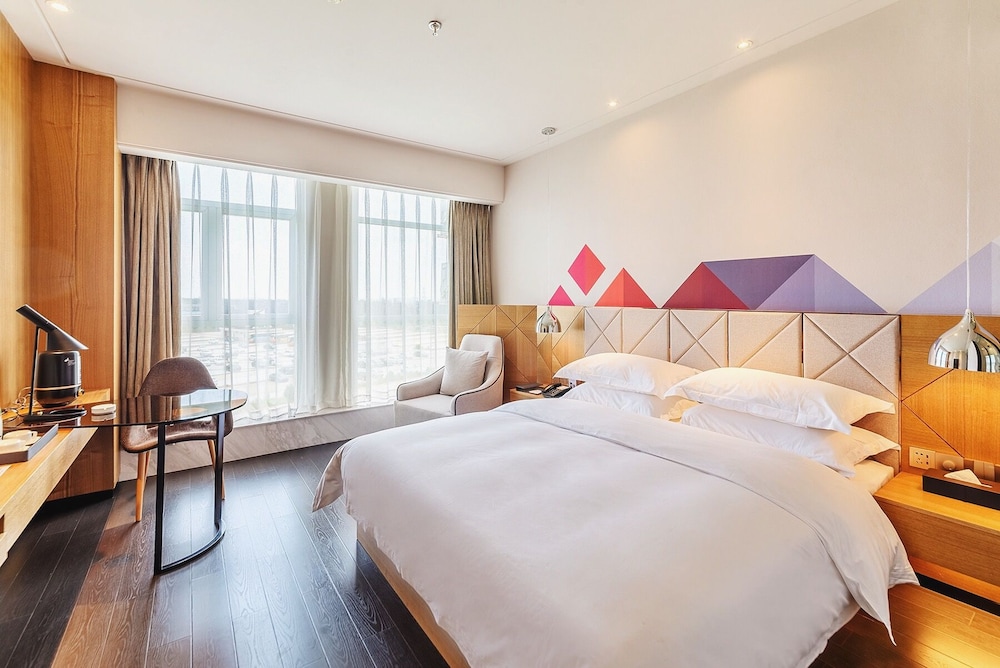 BM Pleasure-Premier Queen Room photo 1