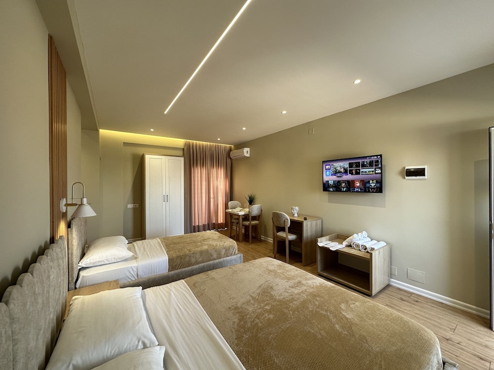 Billede 7 af Deluxe Triple Room, Balcony, Beachside