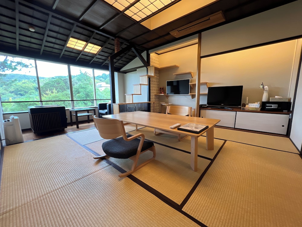 Deluxe Quadruple Room, Garden View