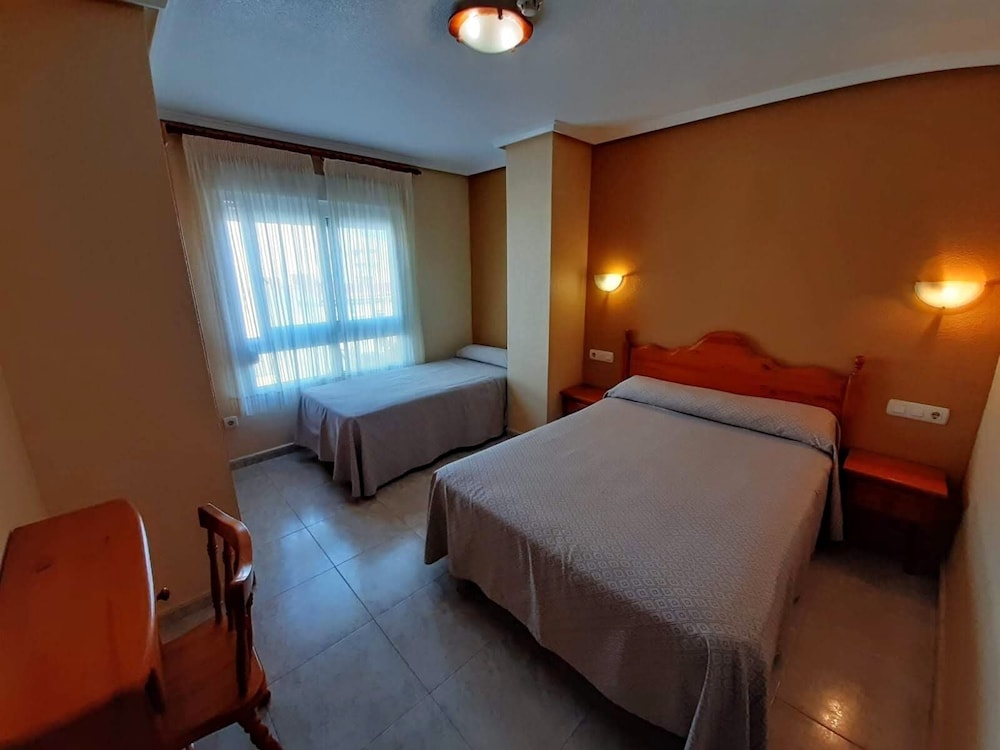 Triple Room - Photo 1