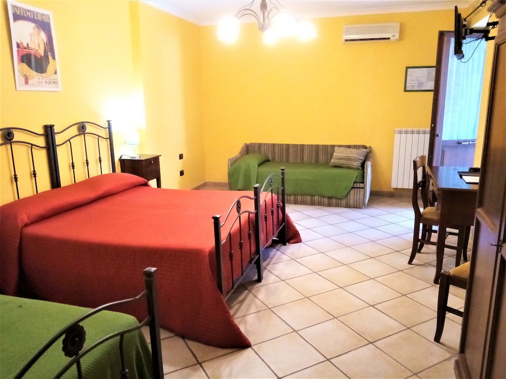 Basic Quadruple Room, Multiple Beds - Photo 1