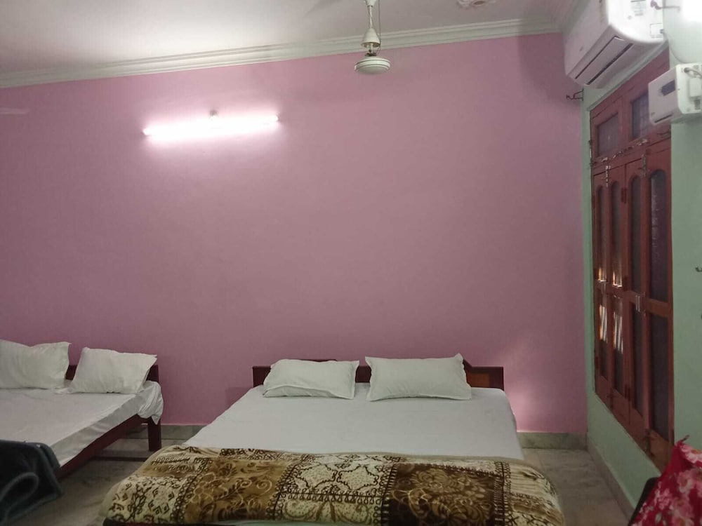 AC bedroom with attached kitchen