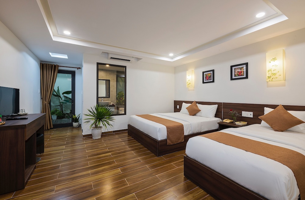 Deluxe Triple Room - Photo 1