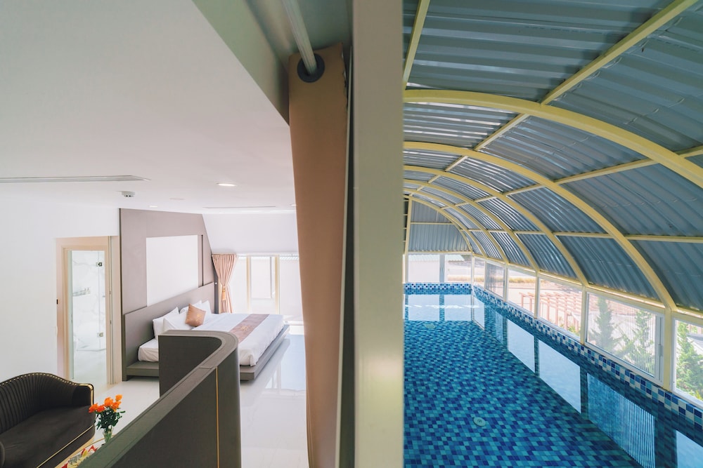Premium Pool View Family Room - Photo 1