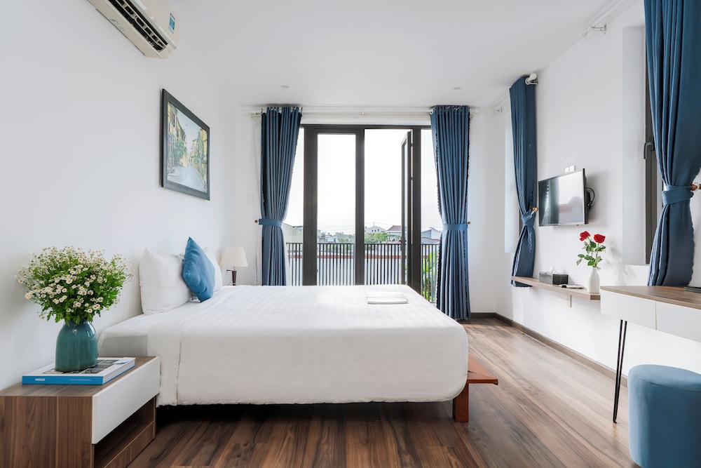 Deluxe Cityscape View Room - Photo 8
