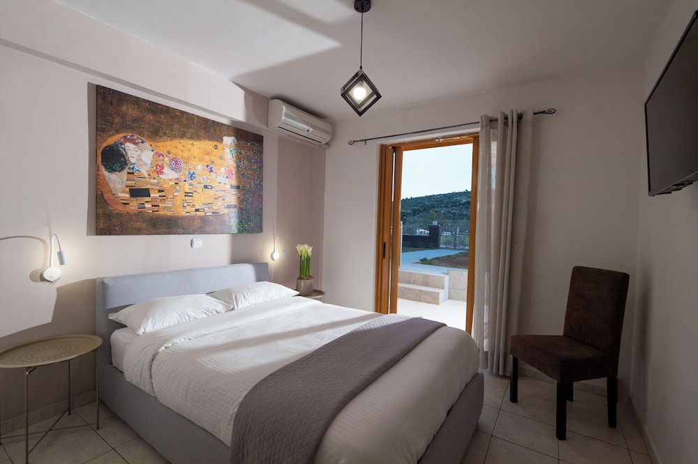 Two-Bedroom Apartment with Garden and Pool View