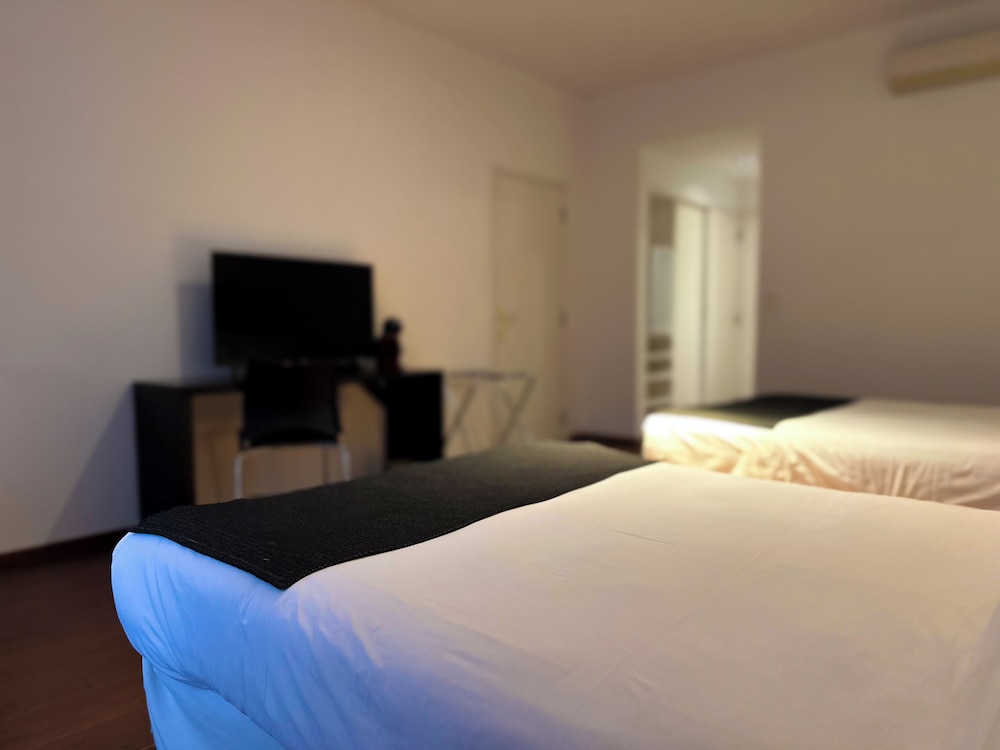 Deluxe Quadruple Room, 2 Queen Beds - Photo 6