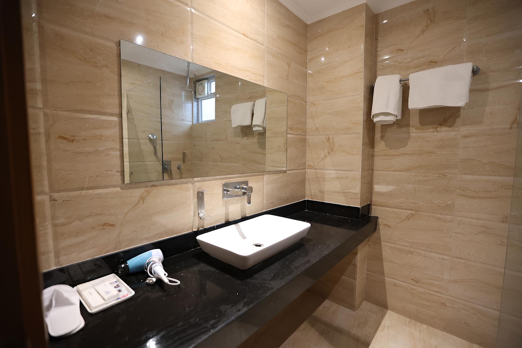 Deluxe Room - Photo 10