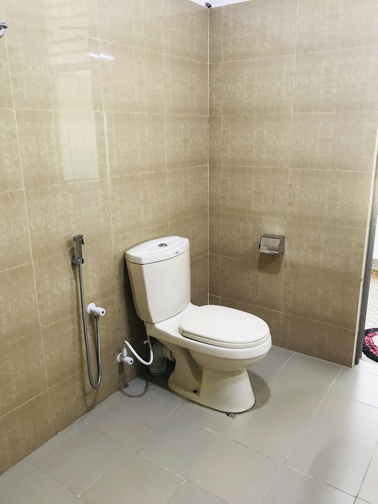 Deluxe Quadruple Room, 2 Queen Beds, Balcony, Garden View photo 2