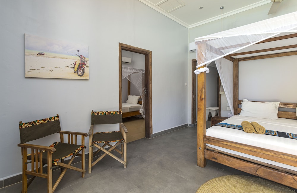 Deluxe Quadruple Room, 2 Bedrooms, Ensuite, Partial Ocean View photo 2