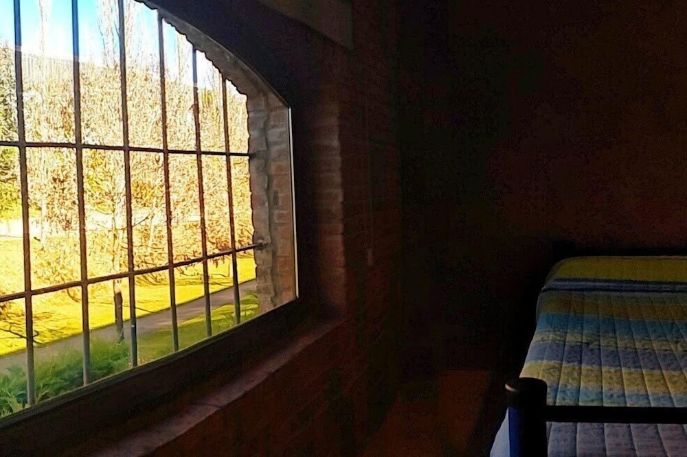 Habitación Cuádruple Familiar con Vista al Jardín