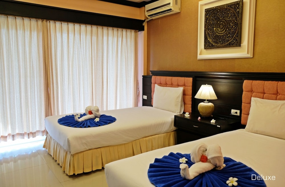 Deluxe Room - Photo 21
