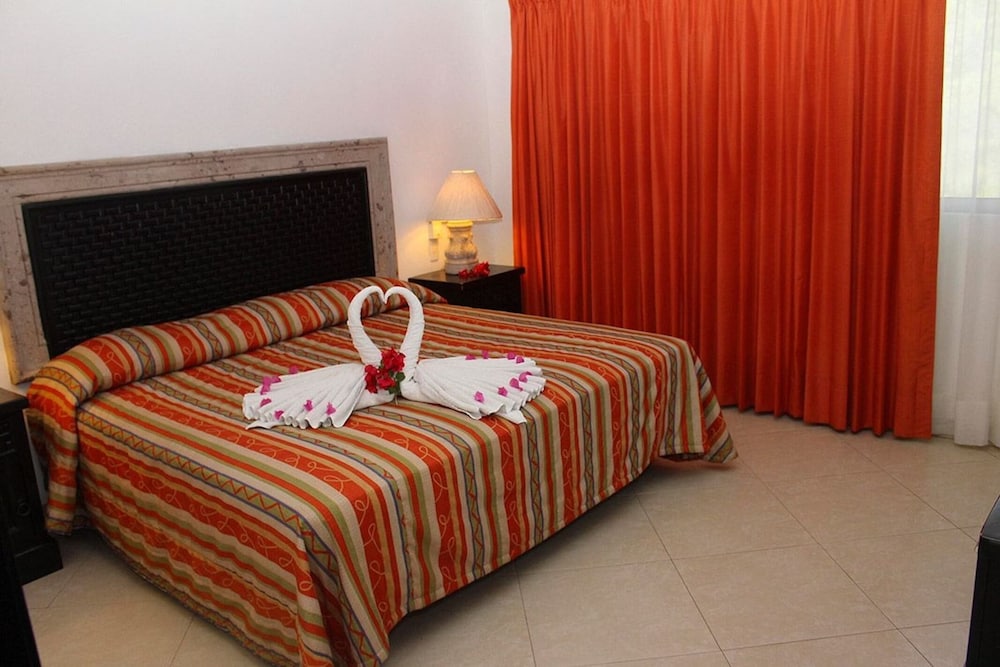 Suite 2 habitaciones con cocineta vista alberca - Tobogan