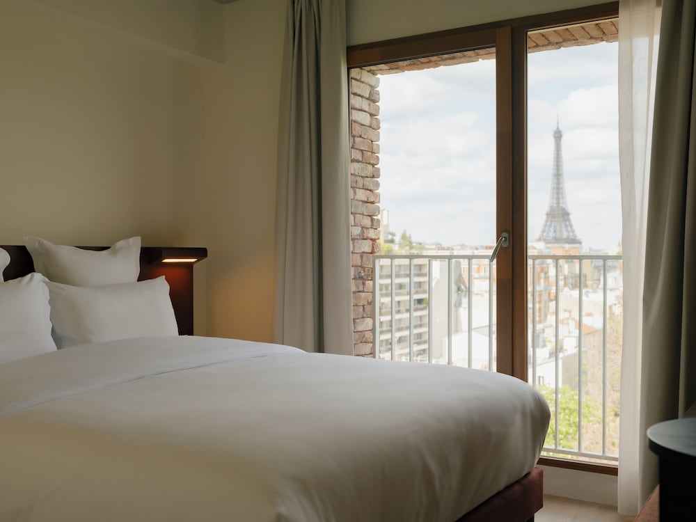 One-Bedroom Apartment with Balcony and City View