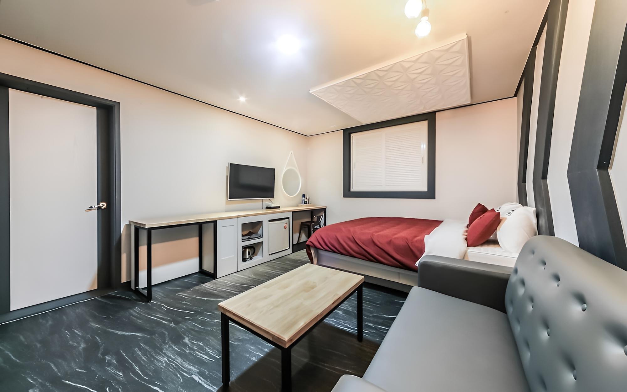 Room (Deluxe B (Bathtub)) photo 3