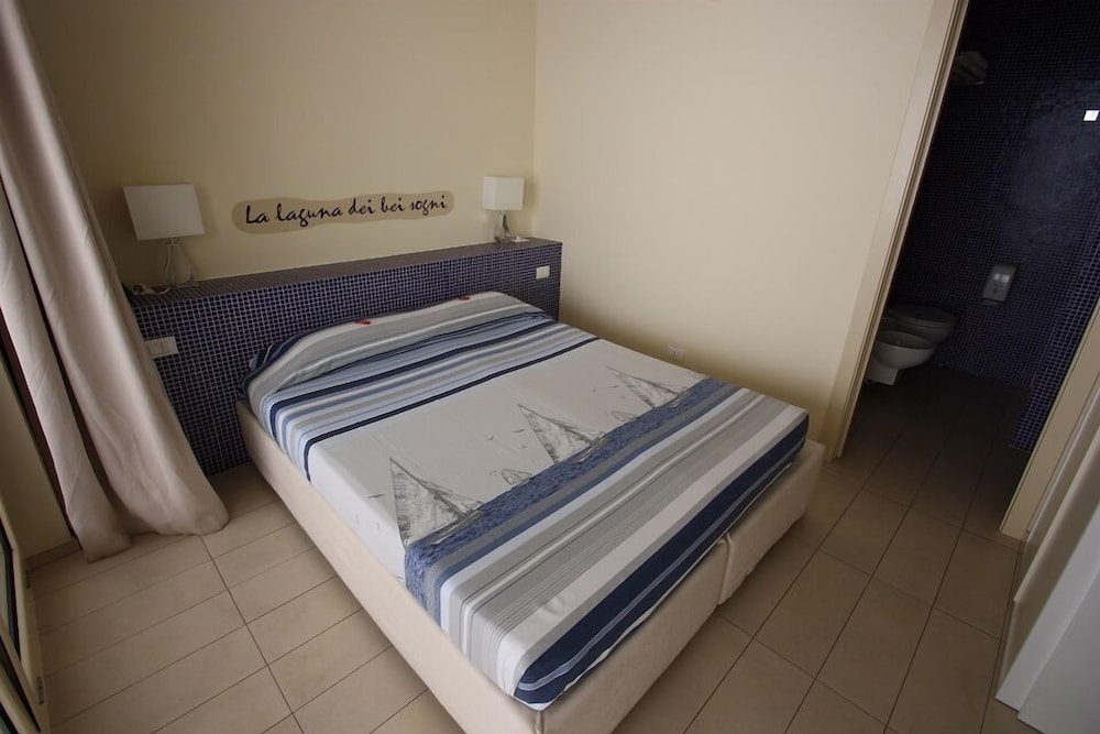 Basic Double Or Twin Room (La Laguna Dei Bei Sogni) photo 1