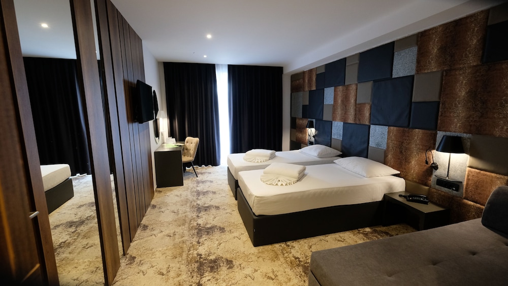 Deluxe Triple Room - Photo 1