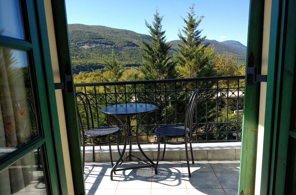 Family Triple Room, 1 Bedroom, Balcony, Garden View photo 1