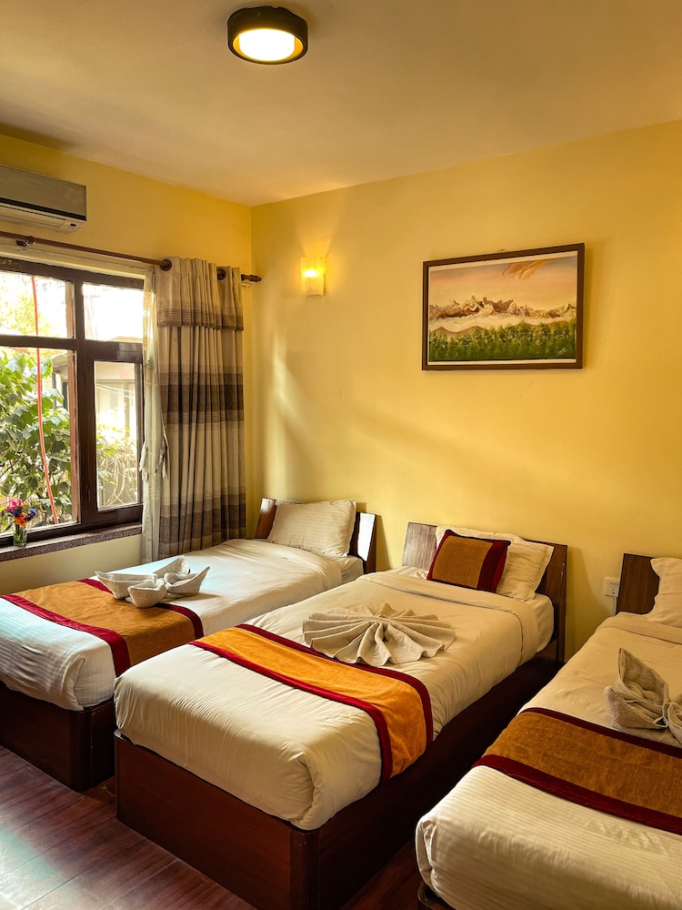 Deluxe Triple Room