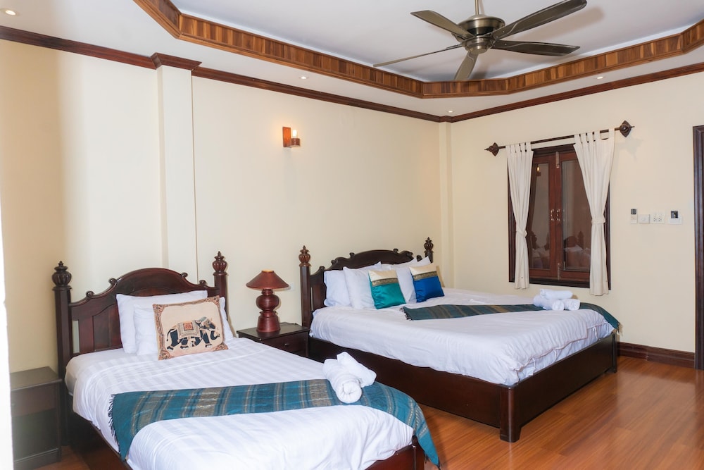 Deluxe Triple Room - Photo 22