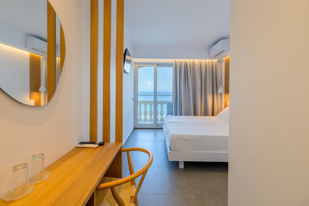 Superior Deluxe Double or Twin Room with Balcony and Pontikonisi island view photo 3