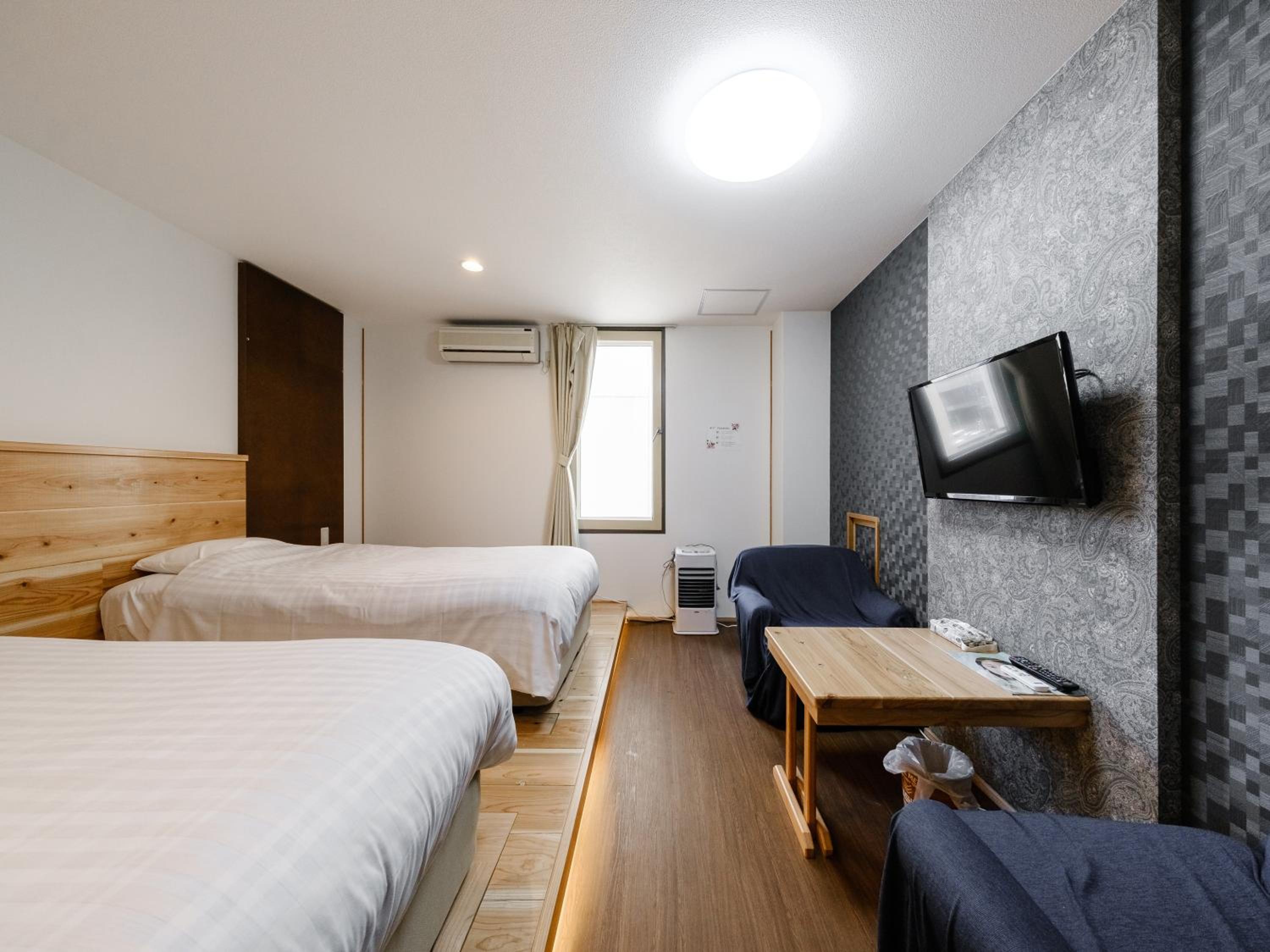 Twin Room - Photo 7