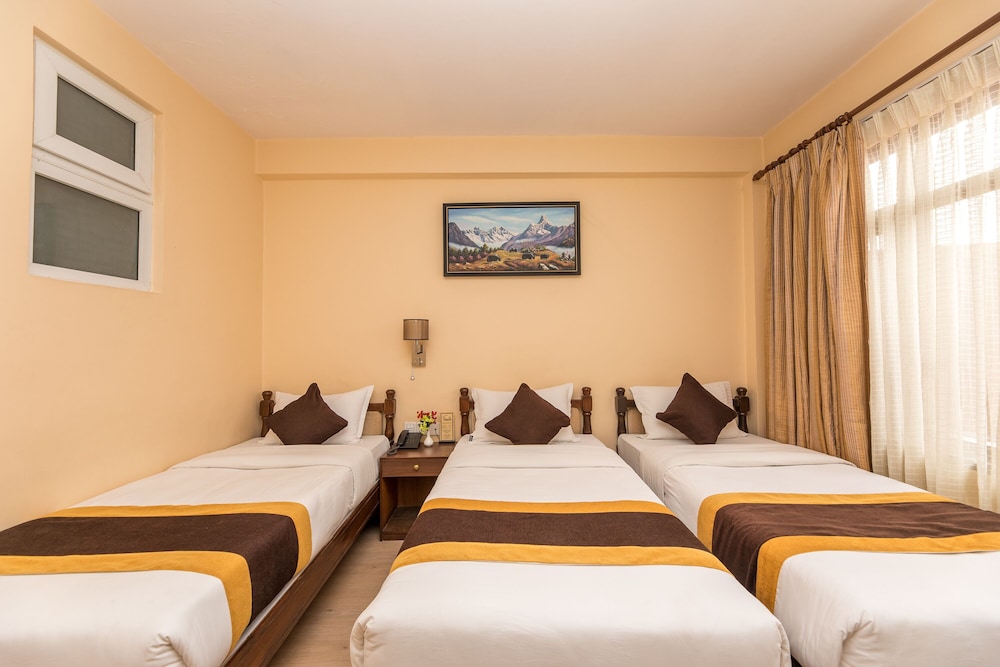 Deluxe Triple Room - Photo 12
