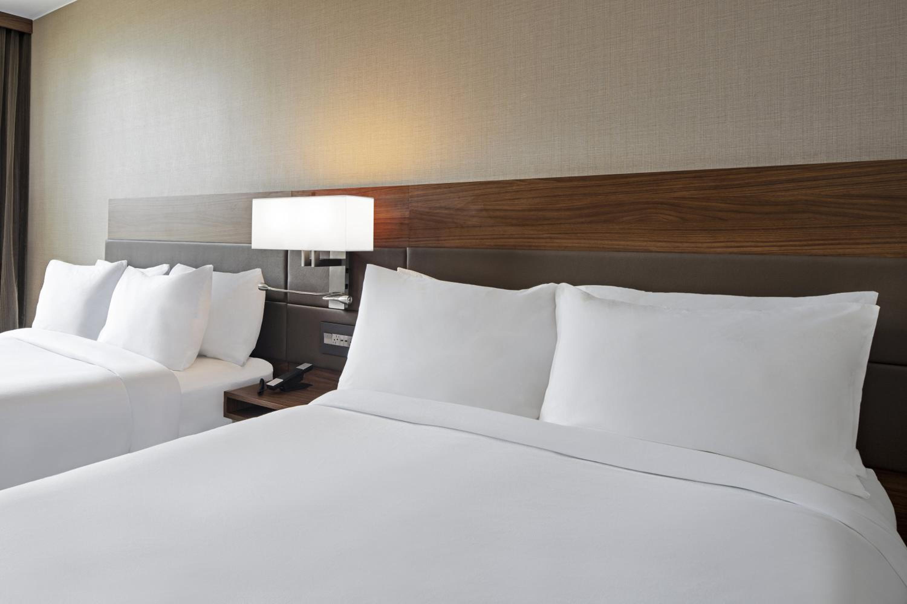 Queen Room with Two Queen Beds - Hearing Accessible photo 2