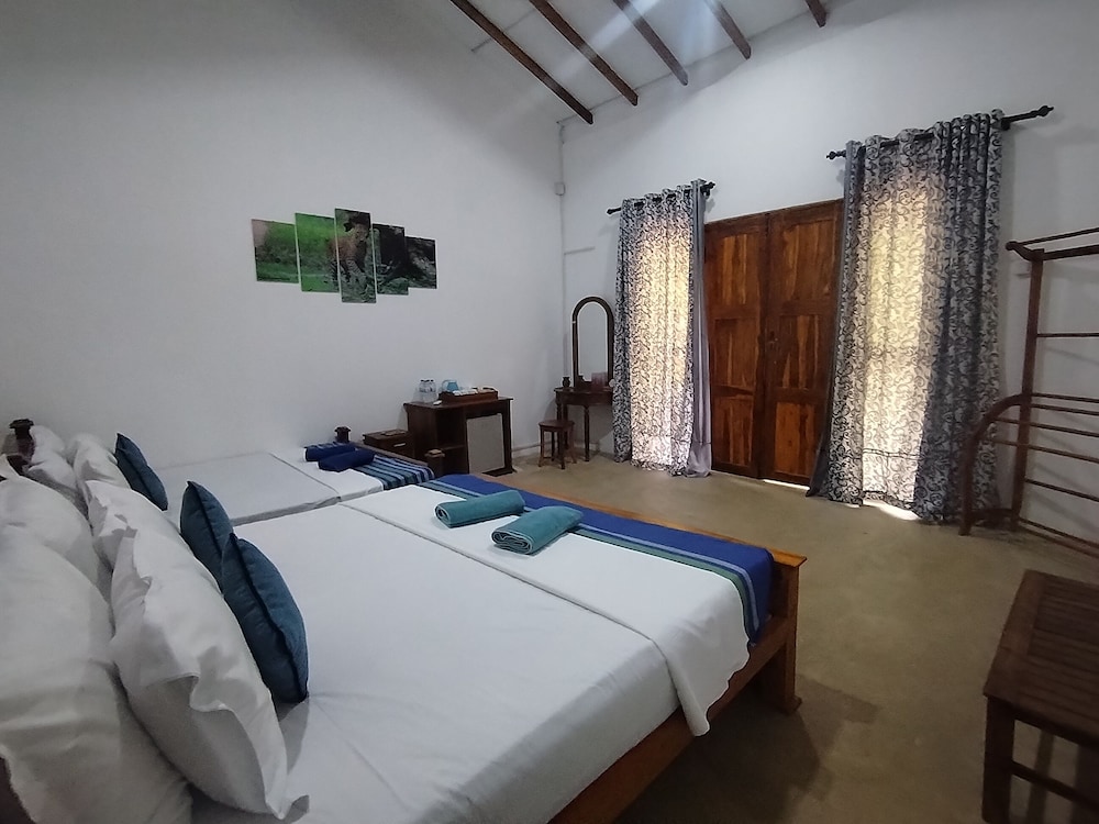 Deluxe Quadruple Room, Garden View photo 2