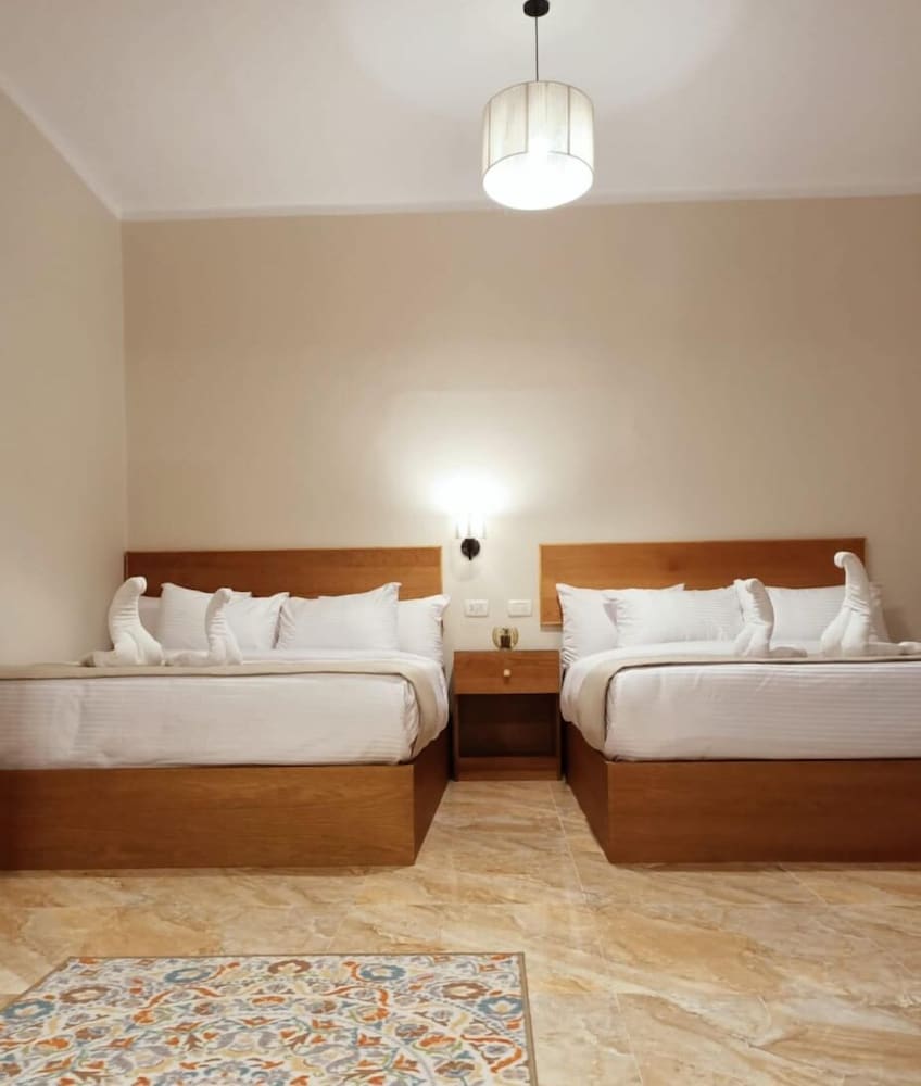 Luxury Quadruple Room, 2 Queen Beds, Non Smoking, Private Bathroom photo 1