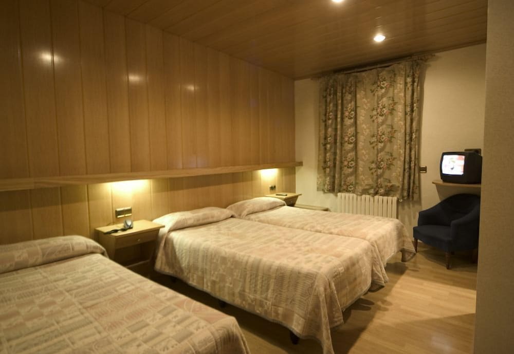 Triple Room - Photo 1