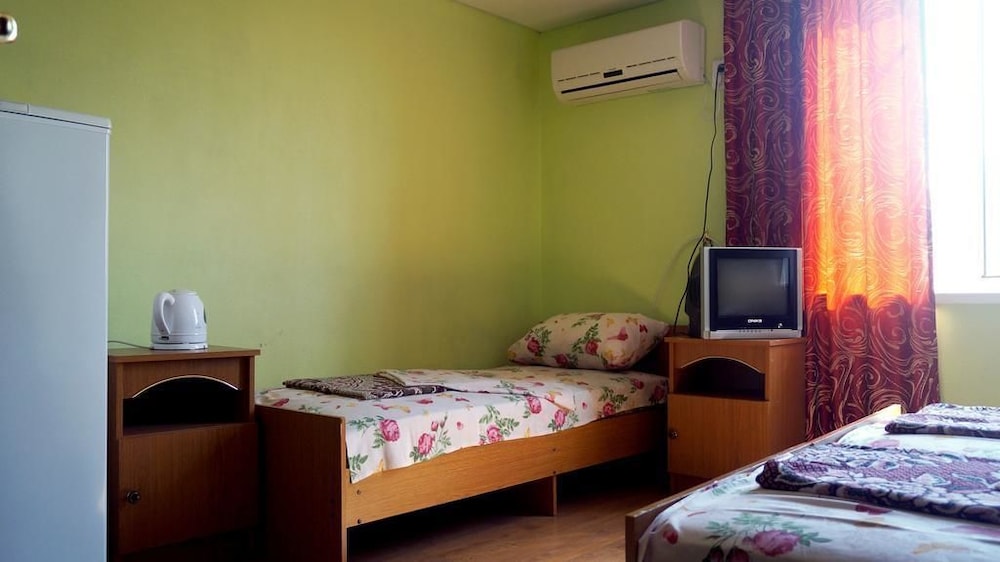 Deluxe Triple Room, Multiple Beds, Courtyard View photo 2