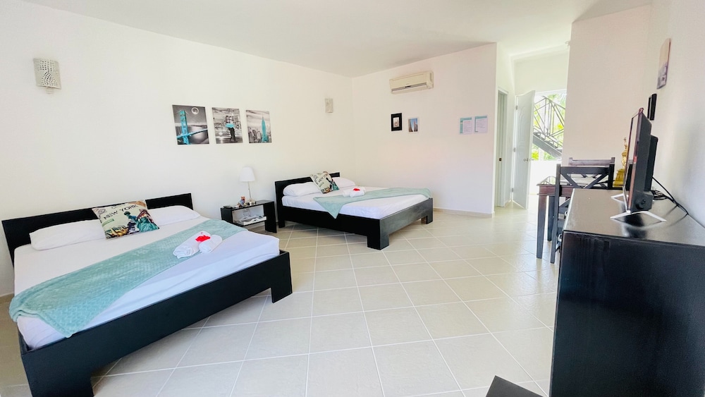 Signature Quadruple Room photo 3