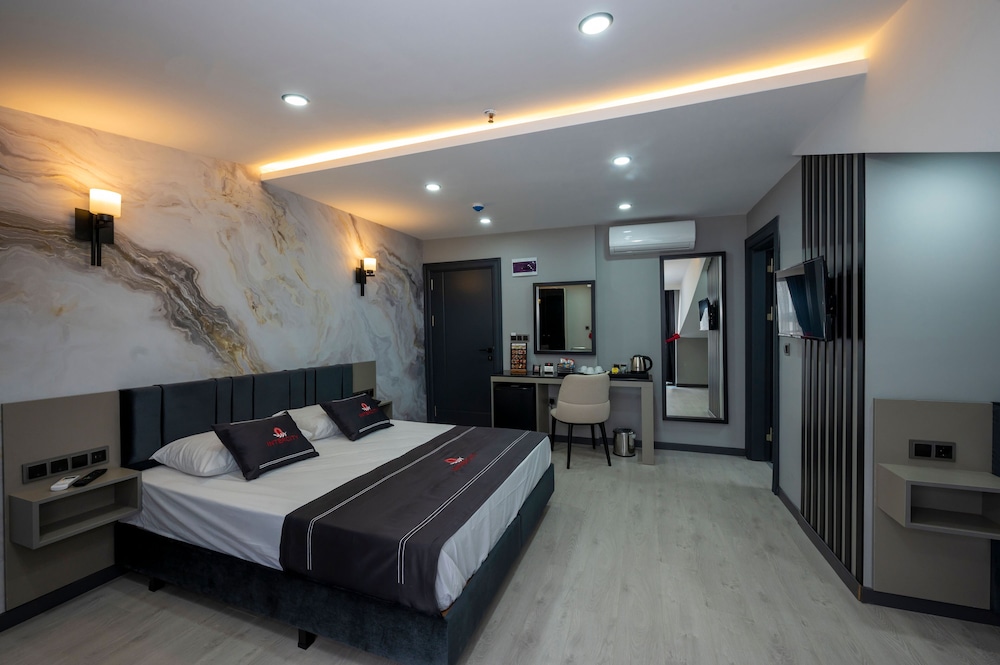 Deluxe Triple Room - Photo 13