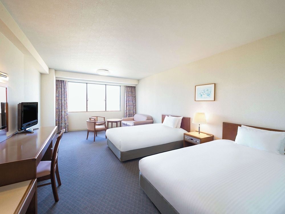 Classic Room with 2 single beds and 2 extra beds