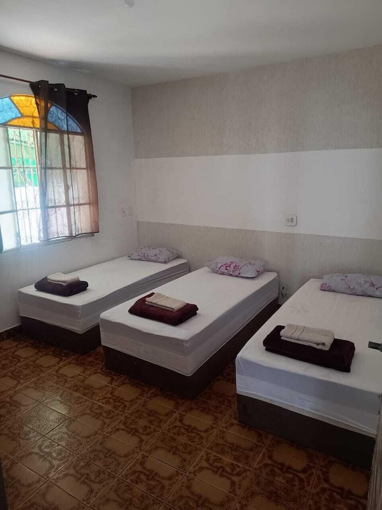 Economy Quadruple Room, City View