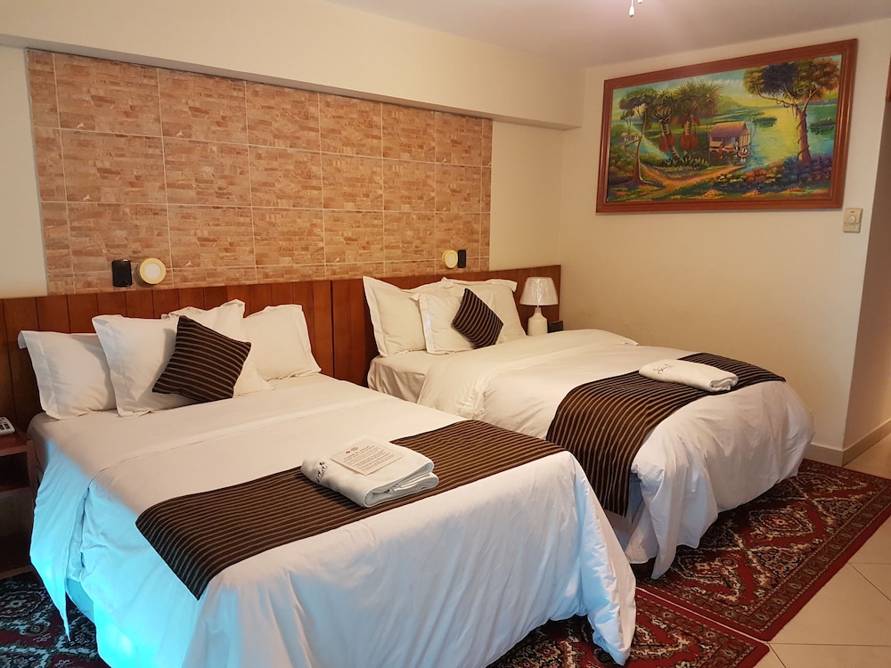 Economy Quadruple Room, Multiple Beds - Photo 2