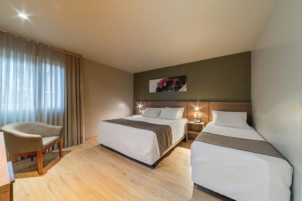Deluxe Triple Room