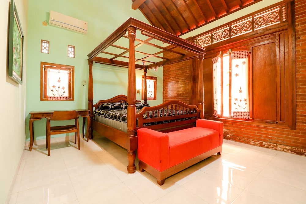 Deluxe Room - Photo 10