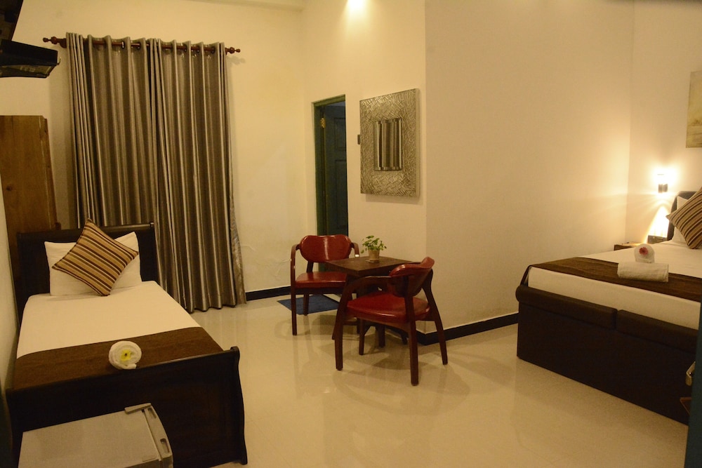 Deluxe Triple Room, 1 Bedroom, Courtyard View photo 3