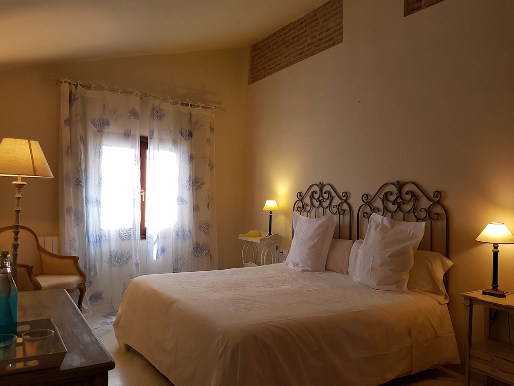 HABITACIÓN TIPO SUITE CON TERRAZA PRIVADA Y VISTAS A LA ALHAMBRA