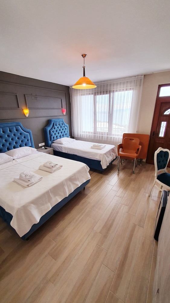 Deluxe Triple Room, Multiple Beds, Non Smoking, Sea View