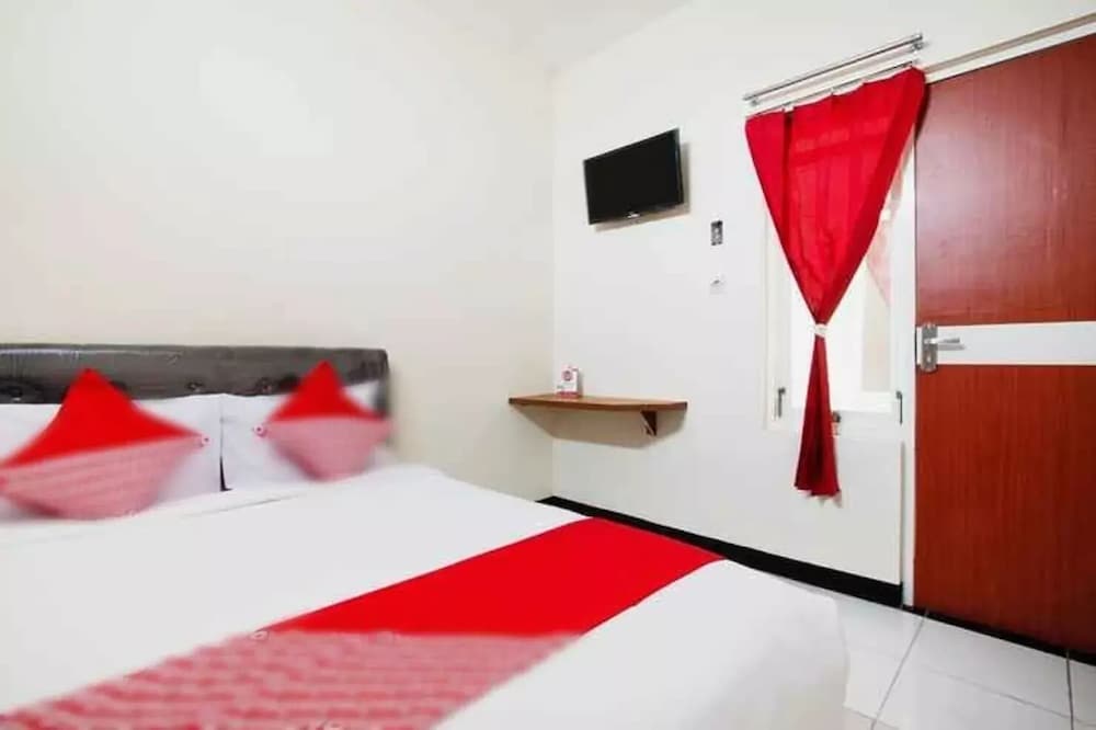 Deluxe Room - Photo 1