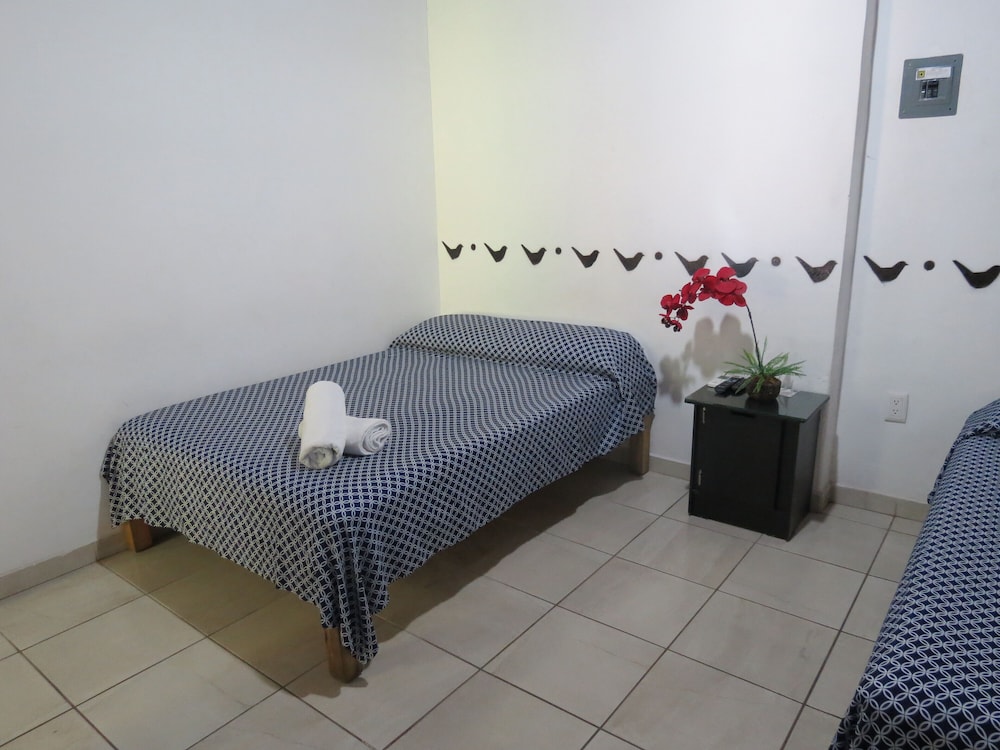 Standard Quadruple Room - Photo 20