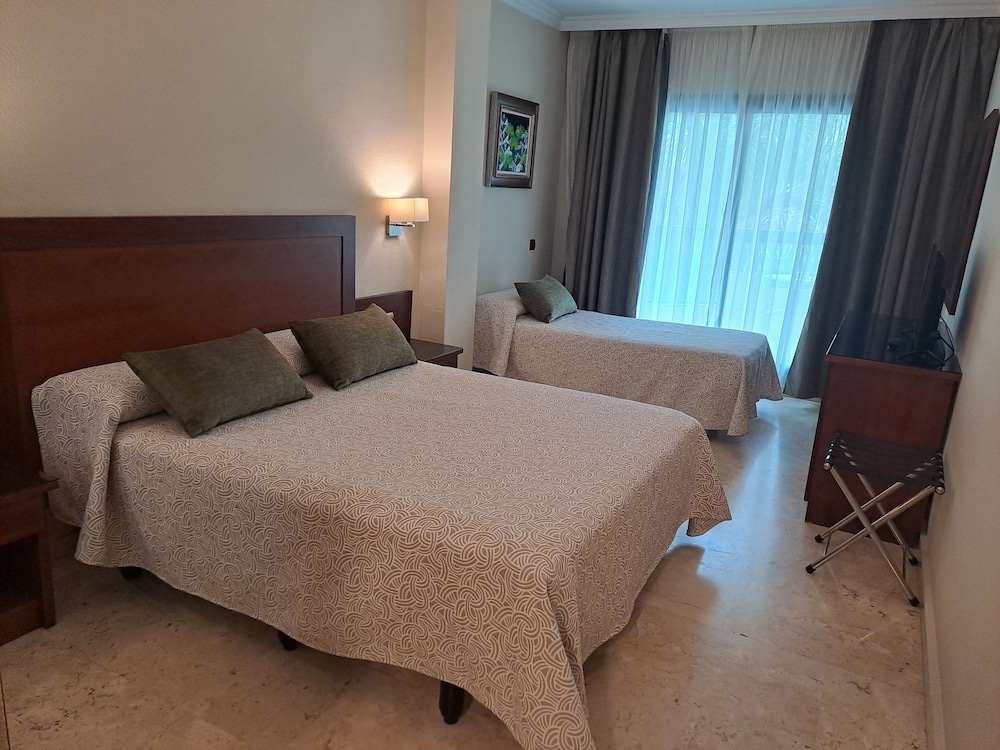 Habitación Triple (2 Adultos + 1 Niño)