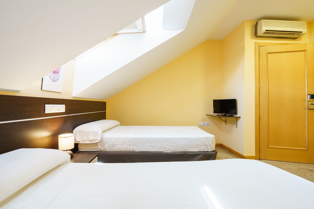 Habitación doble con cama extra